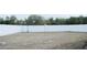 Large, fenced backyard with grass and space for activities at 2600 Pisces Dr, Orlando, FL 32837