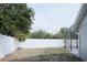 A spacious backyard features a privacy fence, lush greenery, and room for outdoor activities and landscaping at 2600 Pisces Dr, Orlando, FL 32837