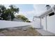 A large, fenced backyard with a patio area at 2600 Pisces Dr, Orlando, FL 32837