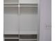 Bright walk-in closet features custom shelving and hanging rods at 2600 Pisces Dr, Orlando, FL 32837