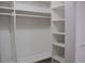 This walk-in closet features ample shelving and hanging space at 2600 Pisces Dr, Orlando, FL 32837