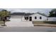 Well-kept single-story home with attached garage and inviting front yard, great curb appeal at 2600 Pisces Dr, Orlando, FL 32837