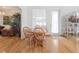 Cozy dining area offers a casual atmosphere with access to outdoor space and bright lighting at 26301 Sackamaxon Dr, Sorrento, FL 32776