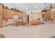 Spacious kitchen with custom wood cabinets, countertop space, and recessed lighting at 26301 Sackamaxon Dr, Sorrento, FL 32776