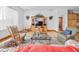 Cozy living room with hardwood floors and comfortable seating at 26301 Sackamaxon Dr, Sorrento, FL 32776