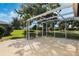 Covered patio offers outdoor living space at 26535 Deuce Ct, Leesburg, FL 34748