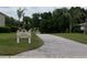 Enjoy the Legacy Nature Trail surrounded by mature trees and lush landscaping at 27024 Old English Ct, Leesburg, FL 34748