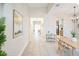 Spacious hallway connecting living spaces, featuring neutral decor and ample lighting at 2749 Hilltop Rd, Clermont, FL 34711