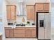 Well-equipped kitchen featuring modern appliances, ample cabinetry, and sleek countertops at 2749 Hilltop Rd, Clermont, FL 34711