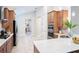 Bright and airy kitchen with modern appliances, granite countertops, and ample storage at 2749 Hilltop Rd, Clermont, FL 34711