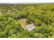 Secluded home in lush greenery, offering a private retreat surrounded by trees with a private field at 2870 Belinda Dr, Deland, FL 32720