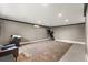 Finished basement area with neutral wall color, contrasting trim, and concrete floors at 2870 Belinda Dr, Deland, FL 32720