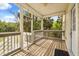 Relaxing screened porch with lovely views of the surrounding nature and trees, offering peaceful retreat at 2870 Belinda Dr, Deland, FL 32720