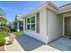 Charming home exterior with well-maintained landscaping and attractive architectural details at 2992 Hicks Pl, The Villages, FL 32163