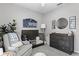 This neutral toned Bedroom features a crib, a glider and a dresser at 301 Brookstone Ln, Fruitland Park, FL 34731