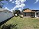 Fenced backyard with well-maintained lawn at 3030 Brighton Rd, Eustis, FL 32726