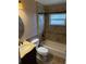 Bathroom featuring an updated vanity and bathtub-shower combo at 3030 Brighton Rd, Eustis, FL 32726