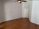 Bedroom featuring beautiful hardwood floors and neutral color walls at 3030 Brighton Rd, Eustis, FL 32726