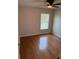 The bedroom has hardwood flooring at 3030 Brighton Rd, Eustis, FL 32726
