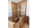 Updated shower with tile surround, mosaic flooring and glass panel at 3030 Brighton Rd, Eustis, FL 32726