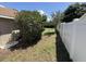 View of the long yard and white fence at 3030 Brighton Rd, Eustis, FL 32726