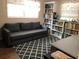 Home office with sofa and bookshelves at 312 North Blvd W, Davenport, FL 33837