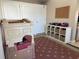 Playroom with ample storage, toy kitchen, and rug at 312 North Blvd W, Davenport, FL 33837