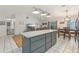 Open-concept kitchen and living room at 35138 Silver Oak Dr, Leesburg, FL 34788