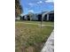 Beautiful condo community on a sunny day with lush green grass at 3748 Idlebrook Cir # 202, Casselberry, FL 32707