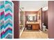 Updated bathroom features a glass-enclosed shower, vanity with a makeup counter, and a toilet at 400 Sw 35Th St, Ocala, FL 34471