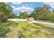 Beautiful home with a large, fenced yard offering privacy and ample space for outdoor activities at 400 Sw 35Th St, Ocala, FL 34471