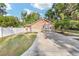Charming home featuring stone accents, a well-maintained yard, and a convenient driveway at 400 Sw 35Th St, Ocala, FL 34471