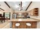 Eat-in kitchen with stainless steel appliances, wood cabinetry, a breakfast bar and lots of natural light, great for daily meals at 400 Sw 35Th St, Ocala, FL 34471