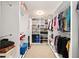 Large walk-in closet with built-in shelving and plenty of room for storage and organization at 400 Sw 35Th St, Ocala, FL 34471