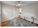 Wood-floored bedroom with closet and desk at 412 Sunny Ct, Fruitland Park, FL 34731