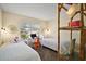 Bright bedroom with a desk area, two twin beds, and lots of natural light at 419 Aldama Ave, The Villages, FL 32159