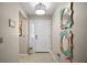 Welcoming entryway with stylish decor, tiled floor, and plenty of natural light at 419 Aldama Ave, The Villages, FL 32159