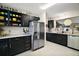 Updated kitchen boasting stainless steel appliances and plenty of storage and countertop space at 419 Aldama Ave, The Villages, FL 32159