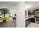 Bright and airy living space with a modern kitchen and comfortable seating area at 419 Aldama Ave, The Villages, FL 32159