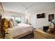 Cozy main bedroom with sliding glass doors and a comfortable seating arrangement at 419 Aldama Ave, The Villages, FL 32159