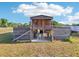 Rustic barn exterior with an open lower level and wooden construction at 4635 Brantley Rd, Groveland, FL 34736