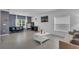 Combination of living room and office space, with tile flooring and natural light at 4905 Vellacito Way, Davenport, FL 33897