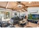 Open-concept living room with vaulted ceilings and hardwood floors at 5045 Maui Cir # 12, Orlando, FL 32808