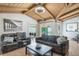 Spacious living room boasting vaulted ceilings, hardwood floors and comfortable seating at 5045 Maui Cir # 12, Orlando, FL 32808