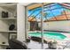 Backyard view showcasing a refreshing pool and patio area, perfect for relaxation and outdoor entertainment at 5045 Maui Cir # 12, Orlando, FL 32808