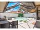 Enclosed pool area with outdoor dining and grilling area at 5045 Maui Cir # 12, Orlando, FL 32808