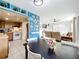 Open floor plan dining area is adjacent to the kitchen and living room at 515 Scenic St, Leesburg, FL 34748