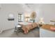 Cozy bedroom with bright sunlight, eclectic decor and a serene, relaxing atmosphere at 5726 Leboeuf Ln, The Villages, FL 32163