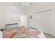 Comfortable bedroom with bright colored accents and a large closet for ample storage at 5726 Leboeuf Ln, The Villages, FL 32163