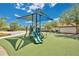 Community playground featuring slides, climbing structures, and safety surfacing at 598 Marcello Blvd, Kissimmee, FL 34746
